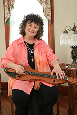 Deb Playing A Fretted Dulcimer